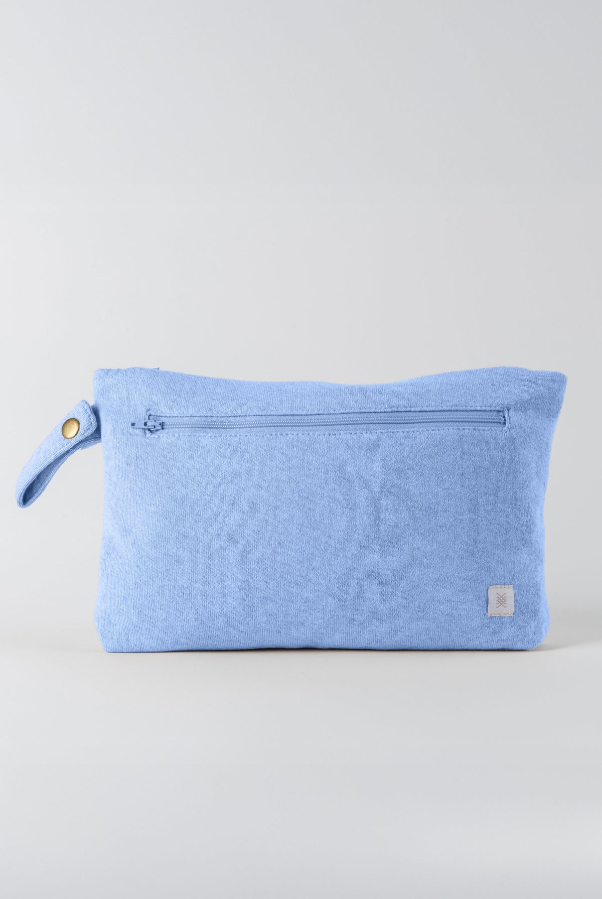 Blue pouch with a zipper on a light gray background