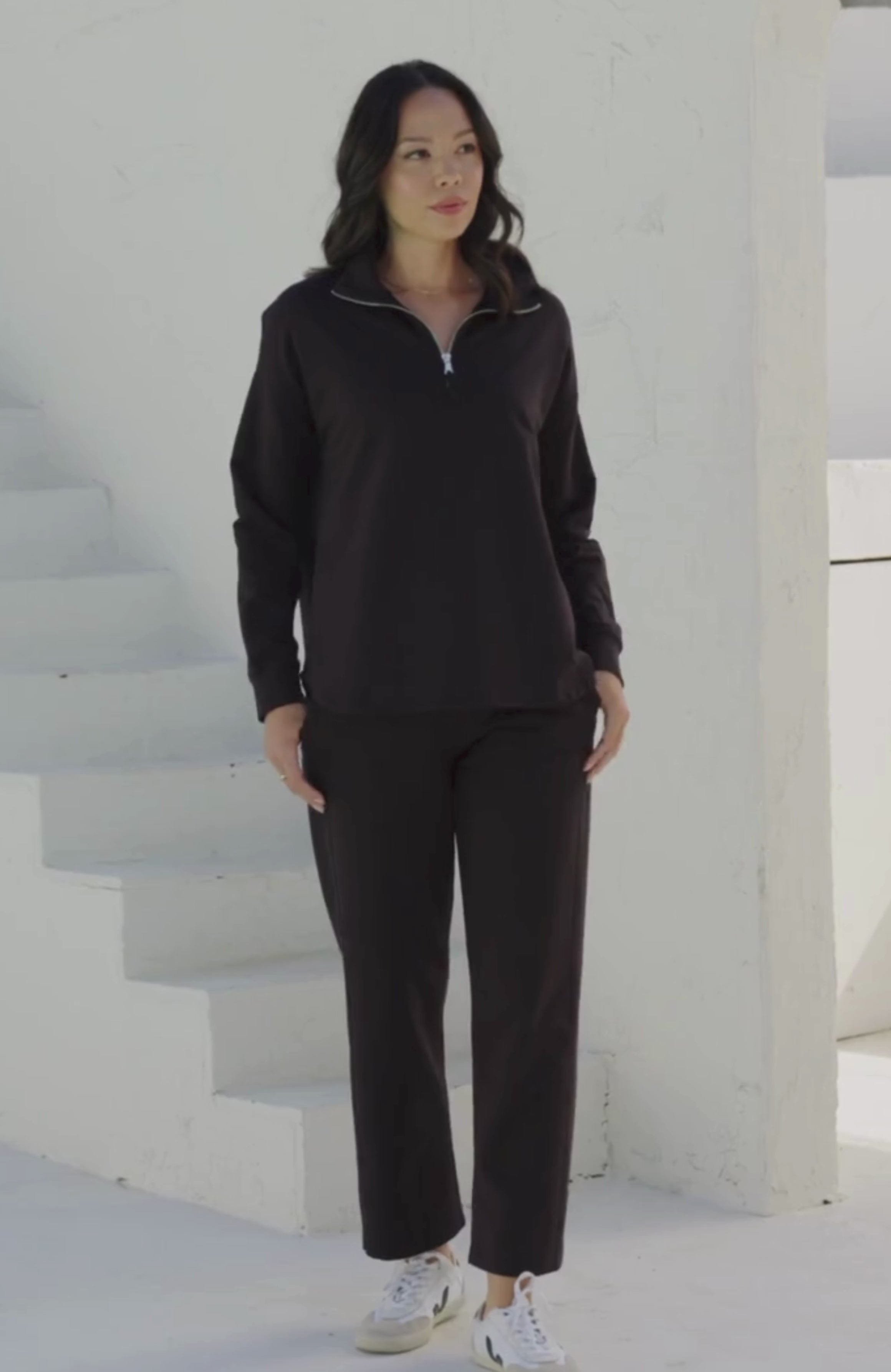 Women shown wearing Black Quarter zip pullover