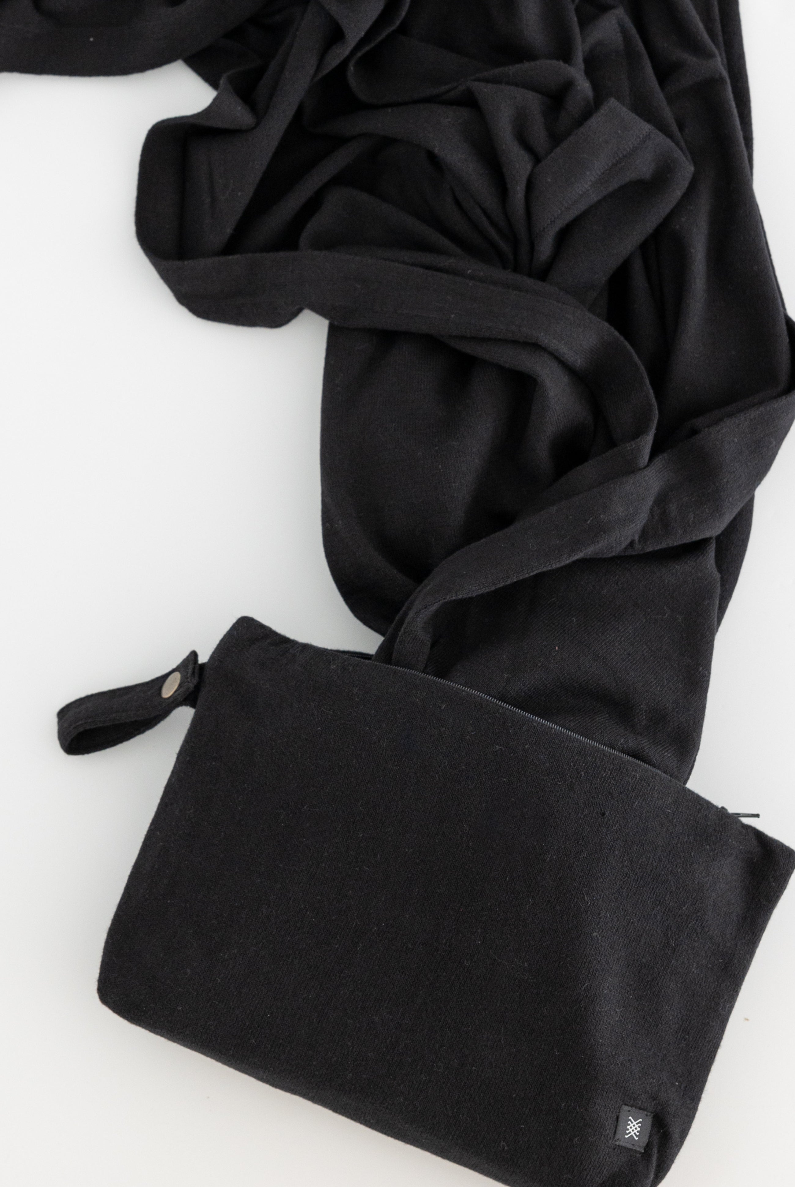 black carry pouch shown with black scarf