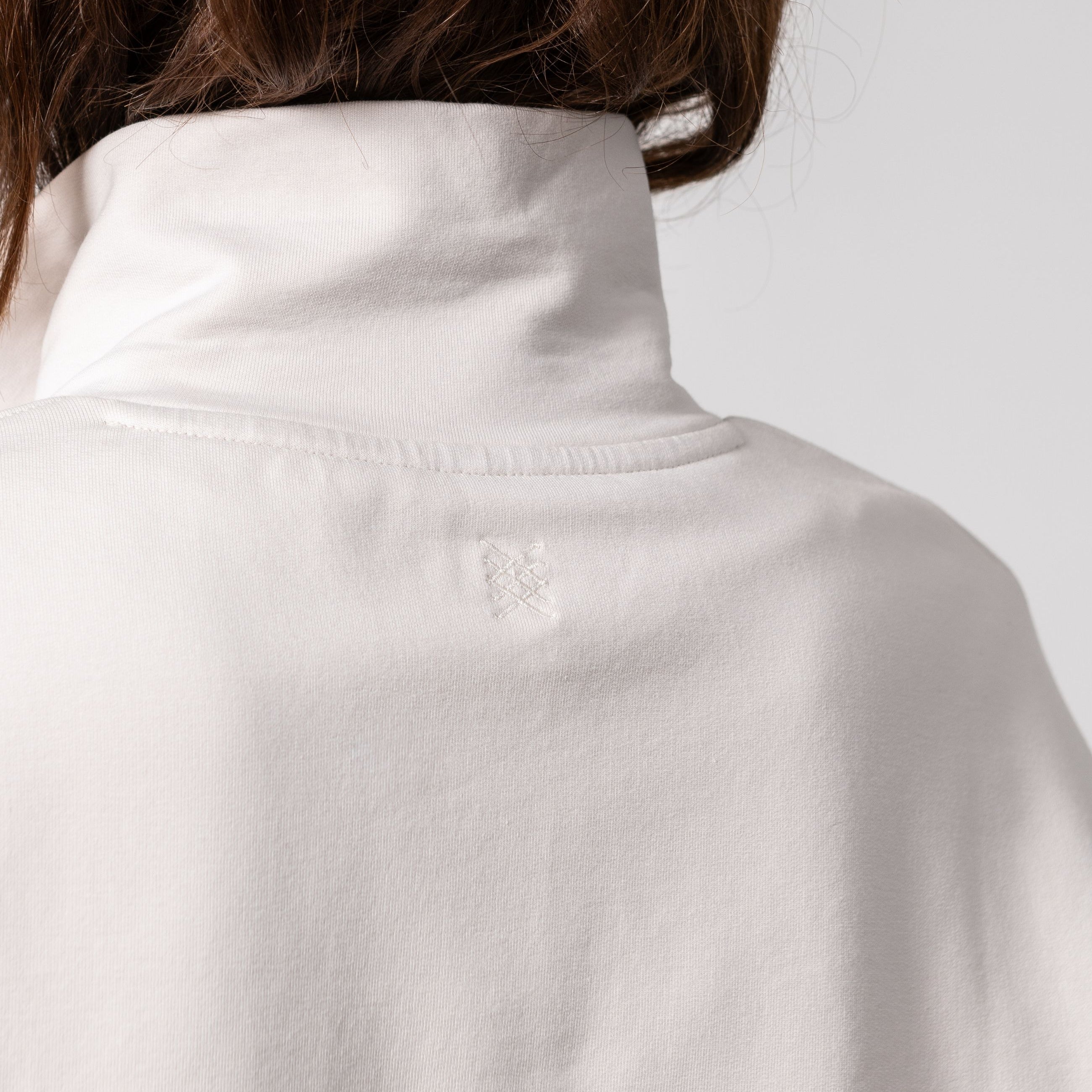 Women shown wearing a Beige Quarter zip pullover