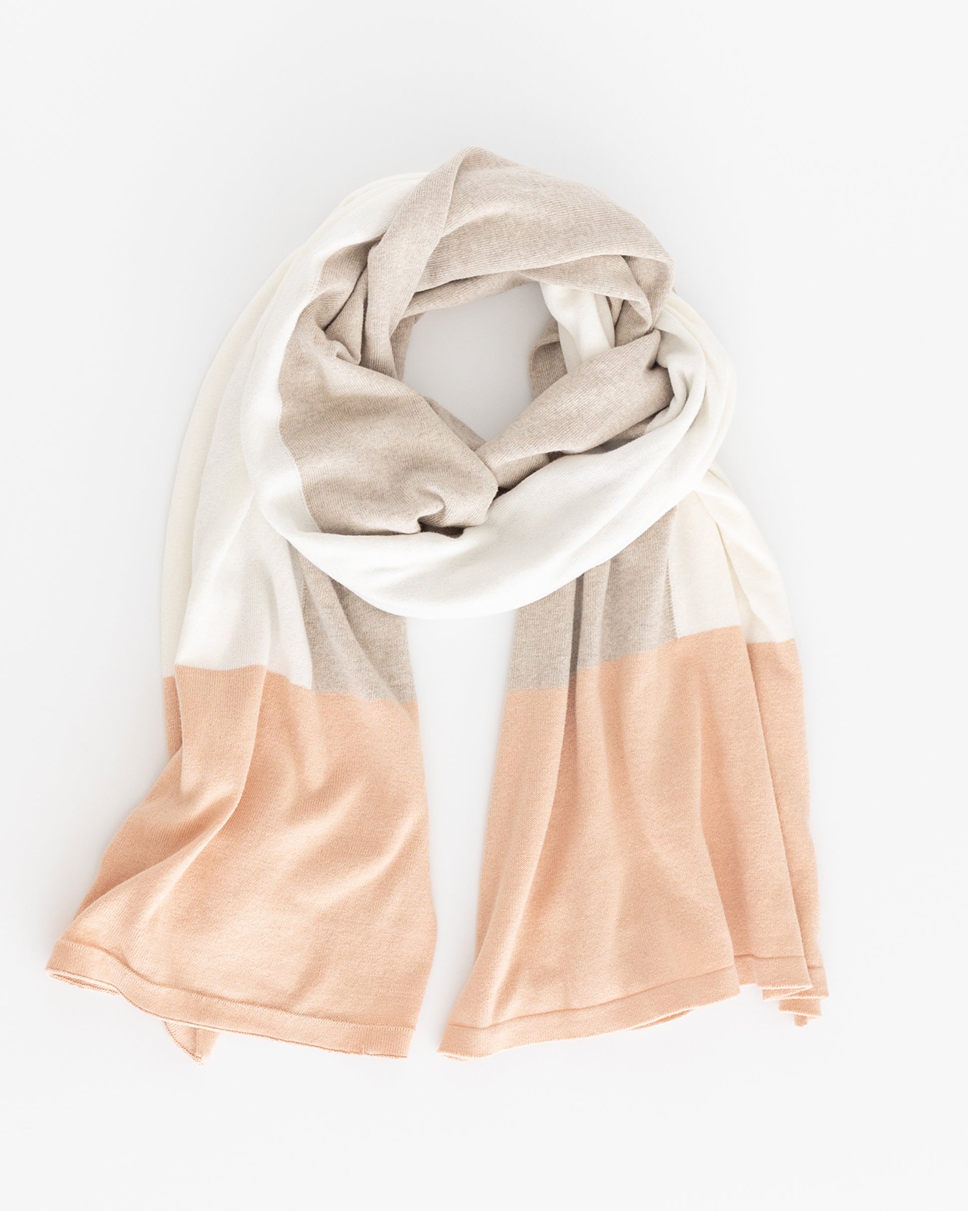 The Dreamsoft Travel Scarf in Blush Colorblock which is a pink, tan and cream scarf