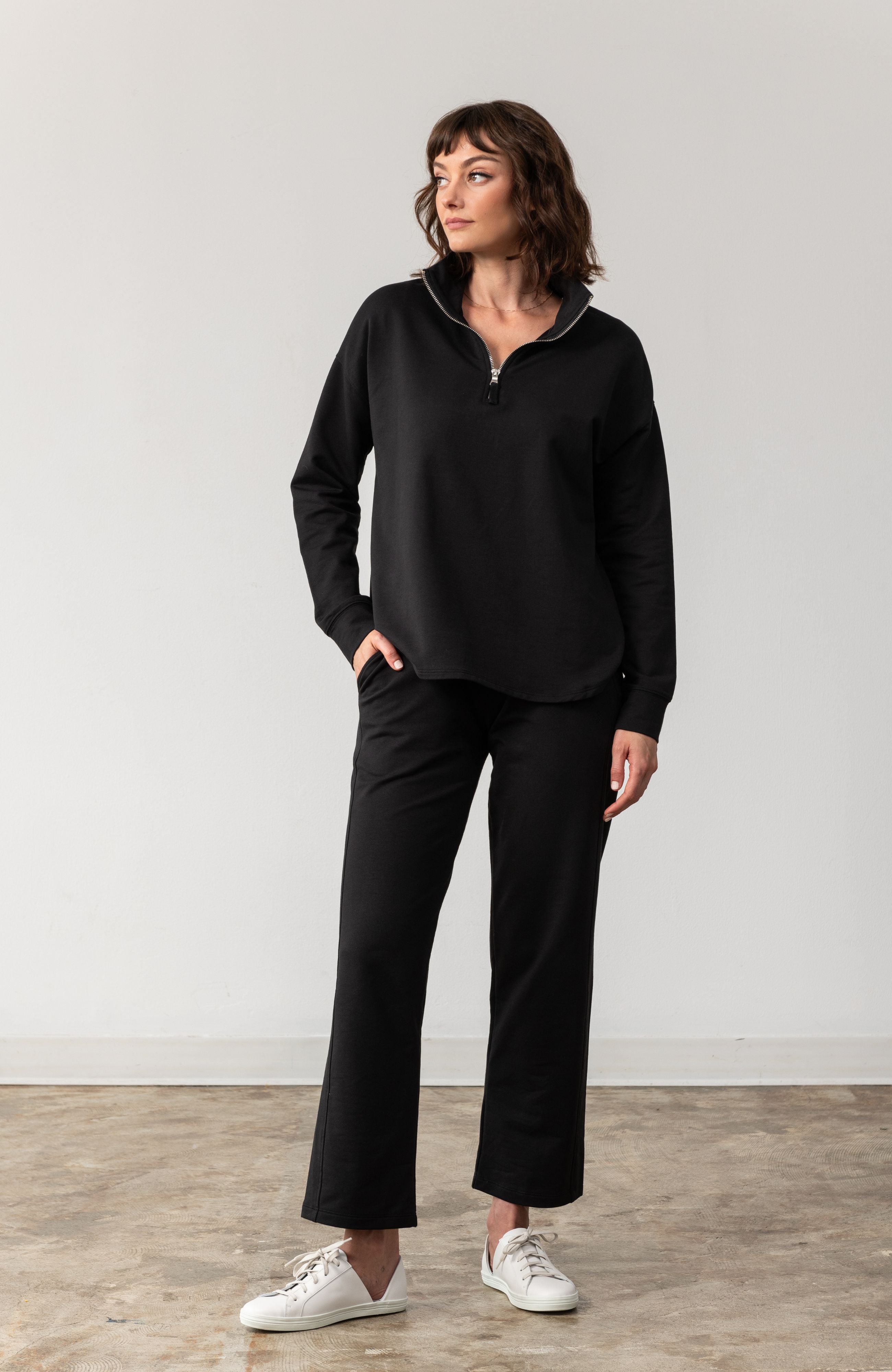 Women shown wearing Black Quarter zip pullover