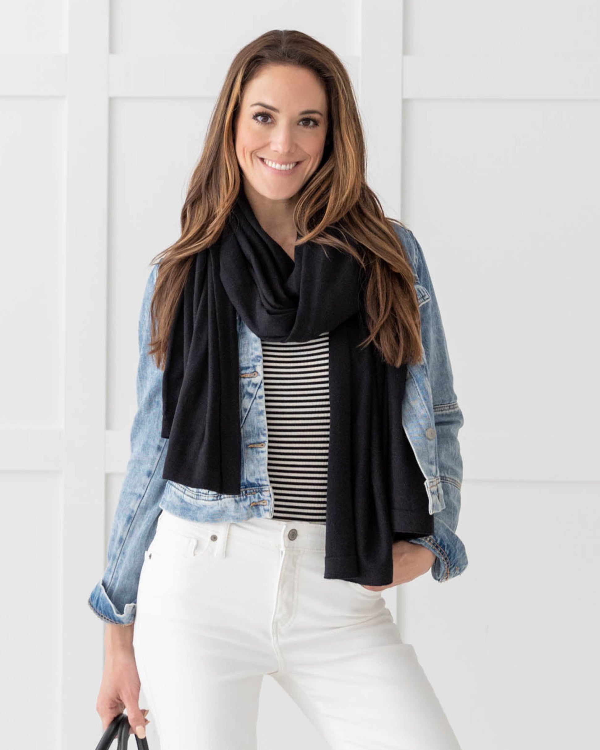 Woman wearing the Dreamsoft Travel Scarf in Black